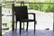 Black rattan chair on the terrace