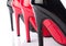 Black and red high heel shoe closeup