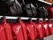 Black and red vehicle`s fuel tanks on the shelves