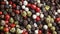 Black red white green and allspice mix peppercorn background