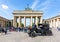 Black retro car in front of Brandenburg Gate Brandenburger Tor, Berlin, Germany