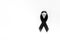 Black ribbon as mourning symbol top view