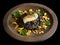 Black rice cooked with cuttlefish ink, and fried calamar