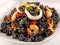 Black Rice Dish with Fresh Seafood in Bowl