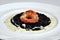 Black risotto and shrimp, Italian creative food