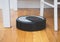 Black robotic vacuum cleaner.