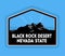 Black rock desert with black mountains