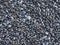 Black rock pebbles mineral stones background