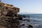 Black rocks of Costa Calma beach. Blue coastline. Playa Barca, Fuerteventura, Canary islands, Spain. Istmo de la pared