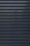 Black roller shutter door closed security background