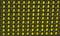 Black rubber mesh on a yellow background with perforation details.