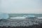Black sand and crystal clear ice chunks at Diamond Beach in Fellsfjara, Jokulsarlon on Iceland