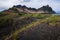 Black sand dunes with the Vestrahorn Batman Mountain in summer ,Iceland.