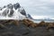 Black sand dunes and Vestrahorn mountain, ocean shore on the Stokksnes Peninsula, Iceland