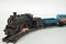 Black Scale model of Steam locomotive Vintage Toy Train and Bogie on a White background Lokgram Kalyan