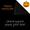 Black scarry Halloween card with a pumpkin and place for text.