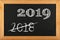 Black school chalkboard with 2019 sign