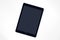 Black screen pad on white background, top view photo of personal gadget. Tablet app mockup. Digital communication