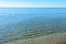 The Black Sea beach with golden sands, blue fresh clear water