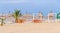 The Black Sea beach, terrace with umbrellas, sand,water and blue sky