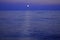 Black sea in the evening with lunar path