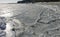 The Black Sea is frozen, ice floes float along the shore. Climate change, harsh winter