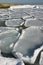 The Black Sea is frozen, ice floes float along the shore. Climate change, harsh winter