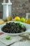 Black Seafood Risotto with Freshly Grated Parmesan and Olive oil