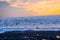 Black seagulls flying over Pacific ocean at sunset in Arica Chile