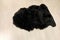 Black sheepskin rug