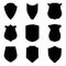 Black shield emblems isolated on white background. Security and police labels. Insignia, awards militaries. Symbol and crest of