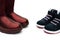 Black shoes for son and red ones for mom as filiation concept