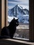 Black Siamese cat sitting in the window watching the snow