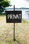 Black sign PRIVAT. View of an Old Weathered & x27;Private& x27; Sign. Vertical