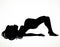 Black silhouette of a beautiful pregnant woman doing yoga training