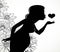 Black silhouette of a beautiful pregnant woman sending an air kiss