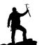 Black silhouette of climber with ice axe in hand