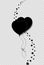 Black silhouette of couple heart balloons bounded together