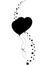 Black silhouette of couple heart shaped helium balloons