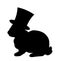 Black silhouette of fluffy rabbit or hare wearing magic cylinder