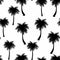Black silhouette palm trees seamless pattern. Tropical repeating background. Nature print.