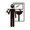 Black silhouette plumber with spanner in bathroom