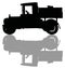 The black silhouette of a vintage tank truck