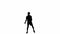 Black silhouette of young male athlete hitting ball with his hand. Practicing ball handling skills in volleyball. Man