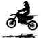 Black silhouettes Motocross rider on a motorcycle