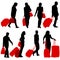 Black silhouettes travelers with suitcases on white background.