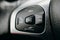 Black and silver automotive side button with volume and call buttons