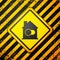 Black Smart home icon isolated on yellow background. Remote control. Warning sign. Vector