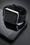 Black smart wrist watches and smartphone