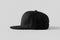 Black snapback cap mockup on a grey background, side view